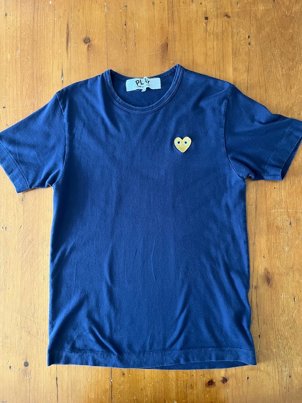 Commes Des Garçons Play Navy T-Shirt with Embroidered Gold Heart on Chest